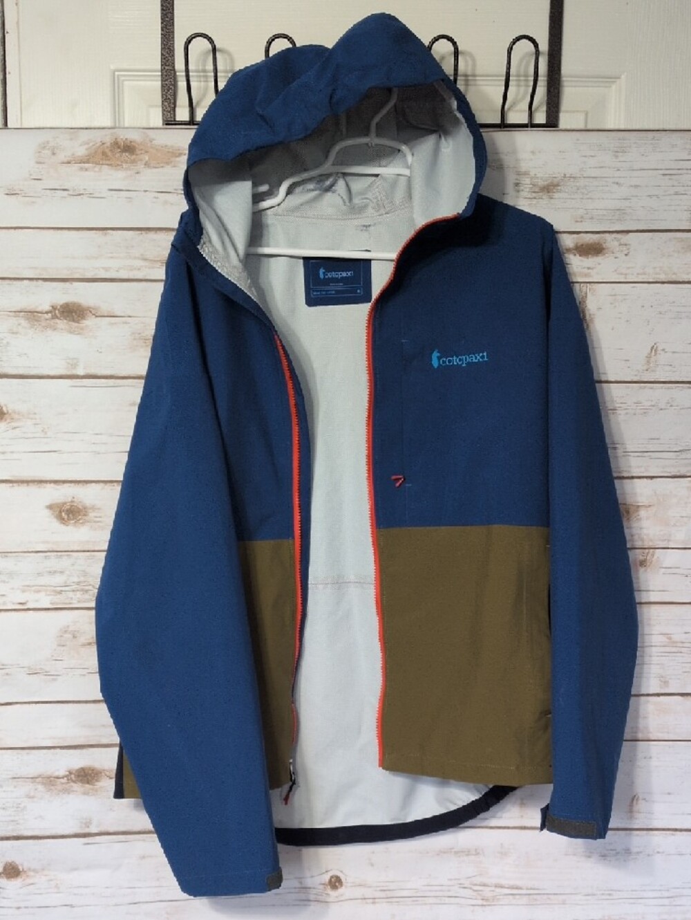 cotopaxi Blue and Olive Hooded Rain Jacket with Orange Zipper - Picture 4 of 5